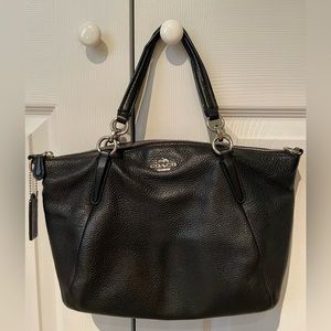 Black coach handbag.